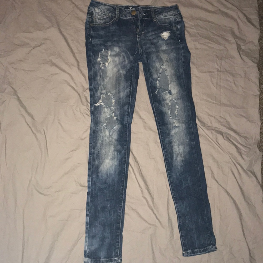 Ripped blue jeans